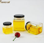 De klassieke Vierkante Jam Honey Jar And Spoon 50ml-730ml van de Suikergoed Plantaardige Salade met Schroefdeksel