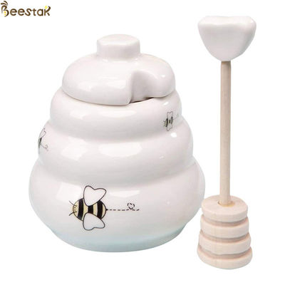 kopen In het groot Wit Leeg Honey Jar Ceramic Honey Pot met houten dipper voor honingsopslag online vervaardiging