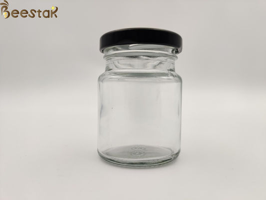 kopen de Fles van het de Vogelnest van 50ml 75ml om Glas Honey Pot Glass Container Bottles met Zwart Deksel online vervaardiging