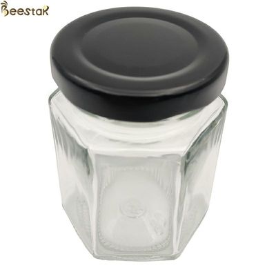kopen ontruimt de Prismatische Fles 45ml 65ml 85ml van 35ml Muti Hexagon Glas Honey Jar online vervaardiging
